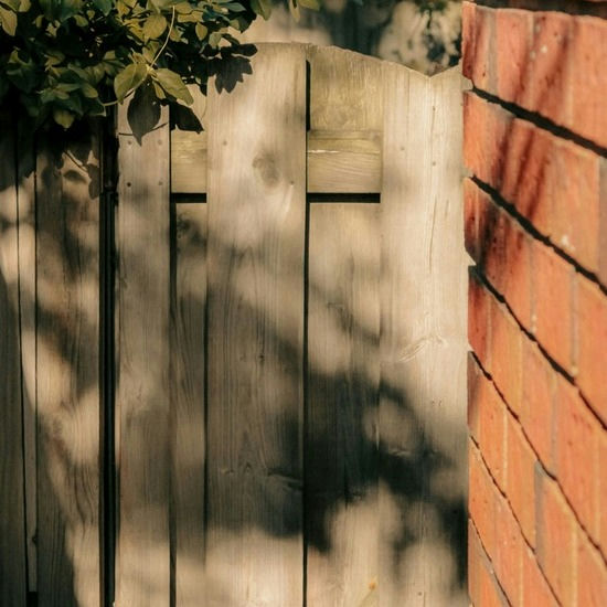 Install wood fence