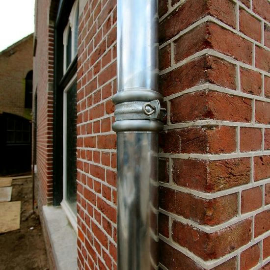 Install downspout